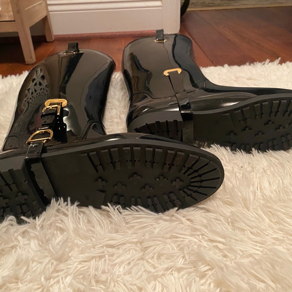 Brand New w/out tags or box. Ralph Lauren black label with gold accents boots.